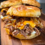 Crockpot Shredded Beef and Cheddar Sandwiches