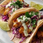 Mouthwatering Fish Tacos with Lime Crema
