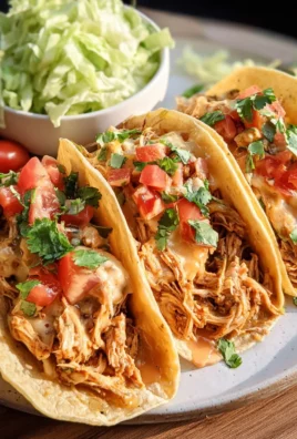 Slow Cooker Queso Chicken Tacos