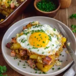 Leberkäse-Kartoffelauflauf mit Spiegelei