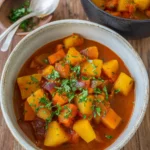 Vegetarisches Kürbis-Curry mit Erbsen (mild scharf)
